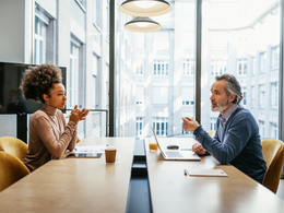 Employee and manager participating in a stay interview to improve employee retention and workplace engagement